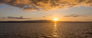 Preview wallpaper sunset, glare, sea, sun, sky
