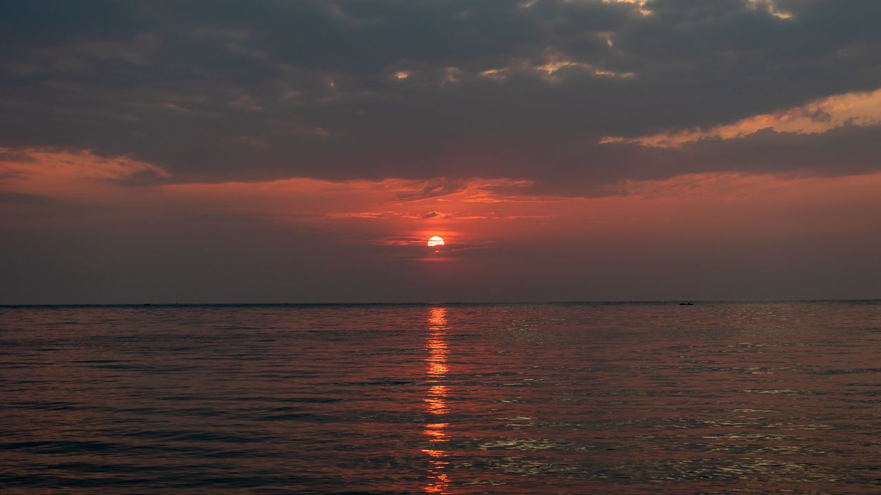 Wallpaper sunset, glare, sea, horizon, clouds