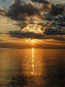 Preview wallpaper sunset, glare, water, horizon, clouds