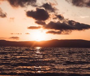 Preview wallpaper sunset, glare, water, horizon, ripples