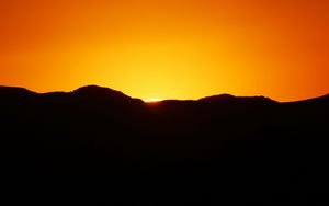 Preview wallpaper sunset, hills, dusk, dark, evening