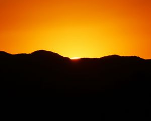 Preview wallpaper sunset, hills, dusk, dark, evening