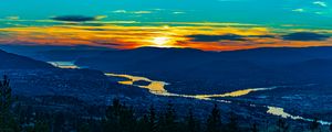 Preview wallpaper sunset, hills, river, valley, aerial view