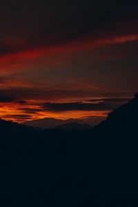 Preview wallpaper sunset, hills, silhouette, landscape