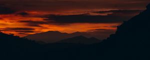 Preview wallpaper sunset, hills, silhouette, landscape