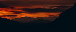 Preview wallpaper sunset, hills, silhouette, landscape