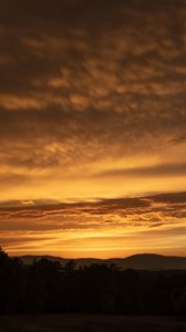 Preview wallpaper sunset, hills, trees, clouds, sky
