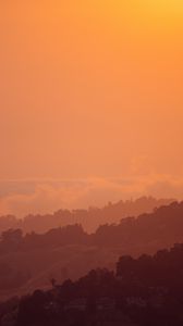 Preview wallpaper sunset, hills, trees, sky