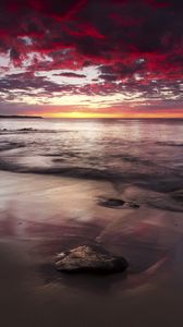 Preview wallpaper sunset, horizon, beach, stones, sea