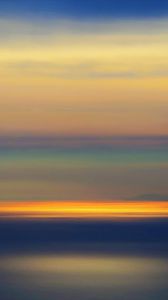 Preview wallpaper sunset, horizon, blur, water, surface, reflection