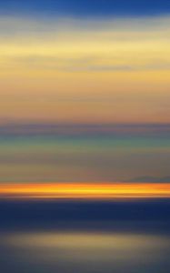 Preview wallpaper sunset, horizon, blur, water, surface, reflection