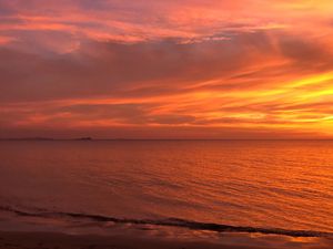 Preview wallpaper sunset, horizon, coast, orange