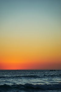 Preview wallpaper sunset, horizon, sea, waves, wavy