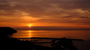 Preview wallpaper sunset, horizon, sea, glare