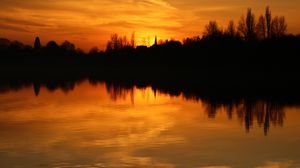 Preview wallpaper sunset, horizon, trees, water