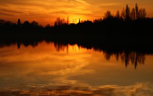 Preview wallpaper sunset, horizon, trees, water