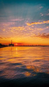 Preview wallpaper sunset, horizon, water surface, pier