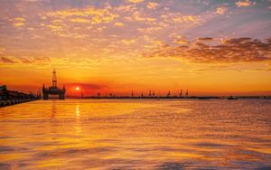Preview wallpaper sunset, horizon, water surface, pier