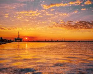 Preview wallpaper sunset, horizon, water surface, pier