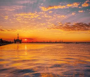 Preview wallpaper sunset, horizon, water surface, pier