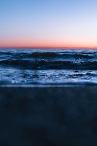 Preview wallpaper sunset, horizon, water surface, waves