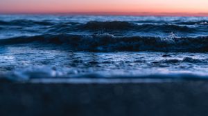 Preview wallpaper sunset, horizon, water surface, waves