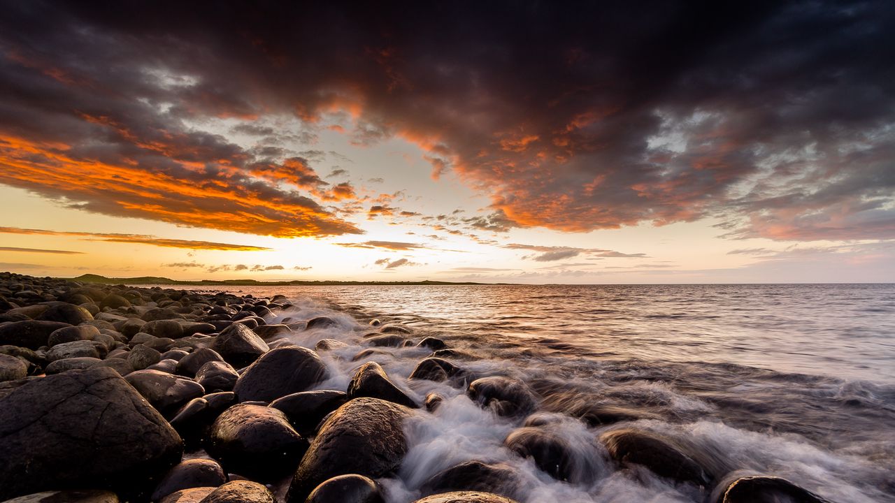 Wallpaper sunset, horizon, waves, stones