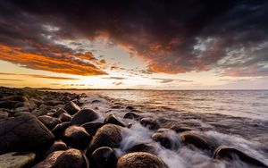 Preview wallpaper sunset, horizon, waves, stones