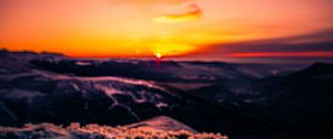 Preview wallpaper sunset, ice, grass, horizon, rocks