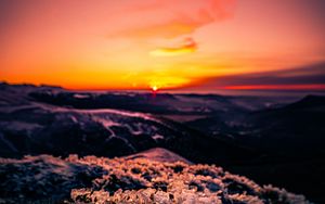 Preview wallpaper sunset, ice, grass, horizon, rocks