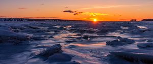 Preview wallpaper sunset, ice, sea, coast, dusk