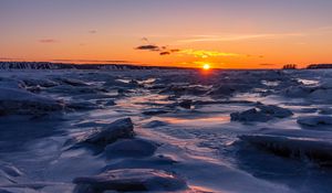 Preview wallpaper sunset, ice, sea, coast, dusk