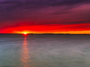 Preview wallpaper sunset, lake, horizon, stone, water