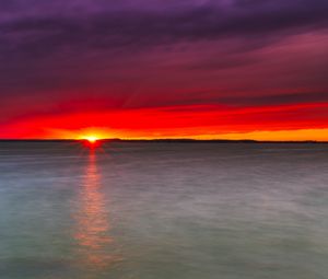 Preview wallpaper sunset, lake, horizon, stone, water