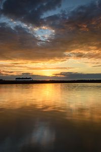 Preview wallpaper sunset, lake, horizon, glare, sky