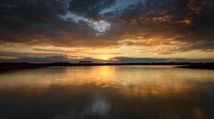 Preview wallpaper sunset, lake, horizon, glare, sky