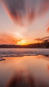 Preview wallpaper sunset, lake, ice, trees, sky