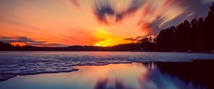 Preview wallpaper sunset, lake, ice, sky