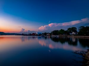 Preview wallpaper sunset, lake, moon, twilight, buildings