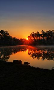 Preview wallpaper sunset, lake, rays, trees, florida