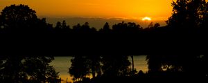 Preview wallpaper sunset, lake, trees, silhouettes, dark