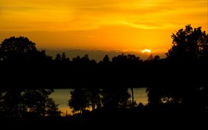 Preview wallpaper sunset, lake, trees, silhouettes, dark