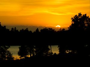 Preview wallpaper sunset, lake, trees, silhouettes, dark
