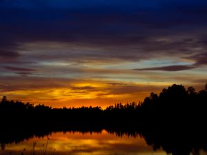 Preview wallpaper sunset, lake, trees, silhouettes, dark, reflection
