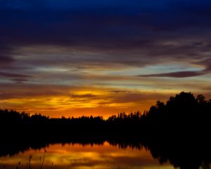 Preview wallpaper sunset, lake, trees, silhouettes, dark, reflection