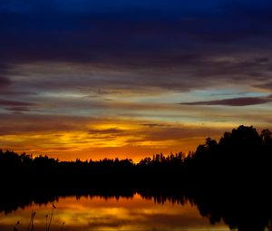 Preview wallpaper sunset, lake, trees, silhouettes, dark, reflection