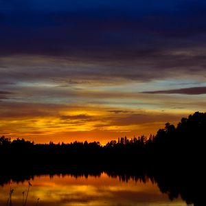 Preview wallpaper sunset, lake, trees, silhouettes, dark, reflection