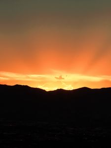 Preview wallpaper sunset, mountains, clouds, rays, dusk