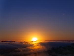 Preview wallpaper sunset, mountains, clouds, sun, horizon, dark