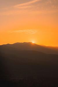 Preview wallpaper sunset, mountains, distance, valley, sky